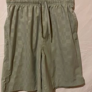 Light silver jogging shorts with stretchable and drawstring waist for comfort